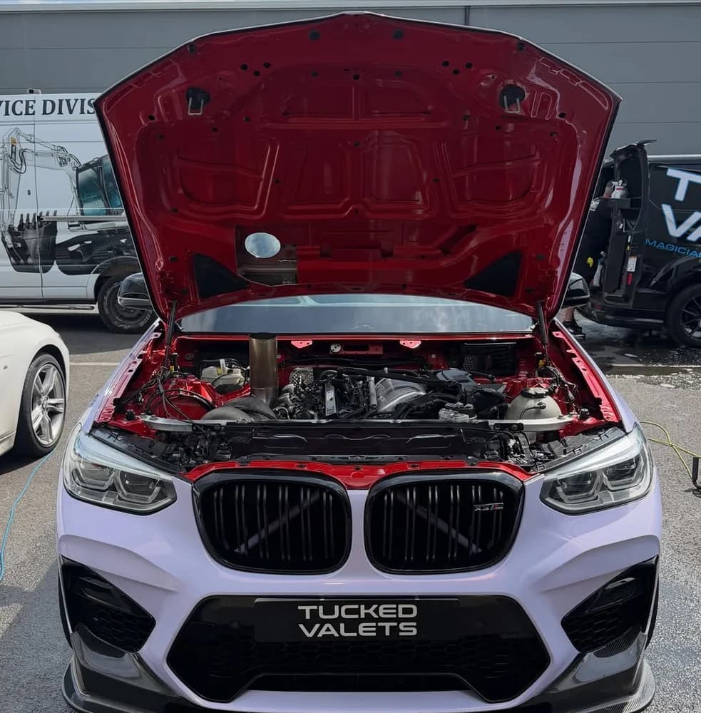 BMW X3M engine bay detailed by Tucked Valets