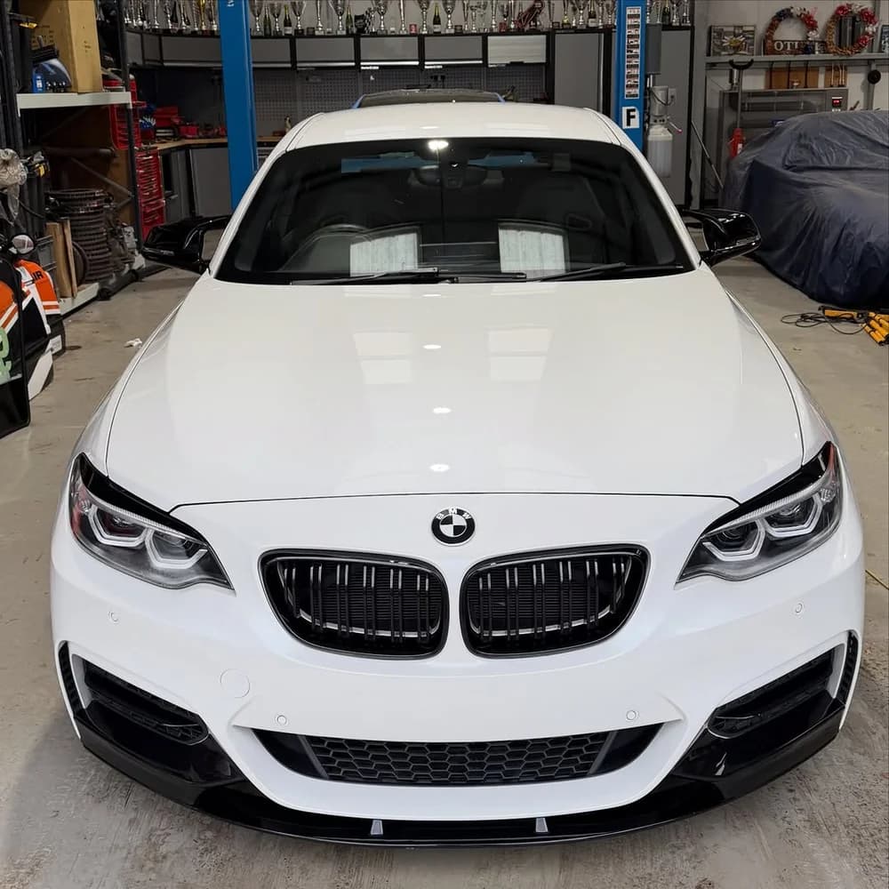 White BMW M240i ceramic coated by Tucked Valets