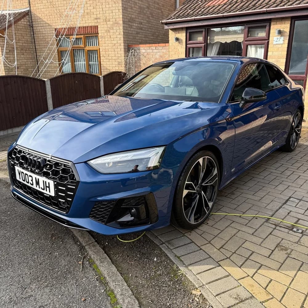 Blue Audi saloon valeted on the driveway in Norwich